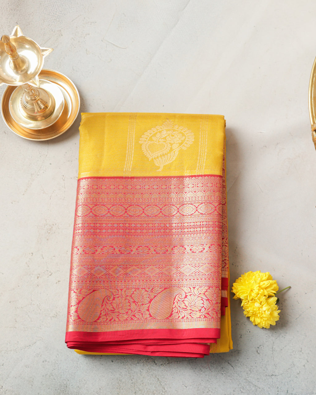 Classic yellow Kanchipuram saree