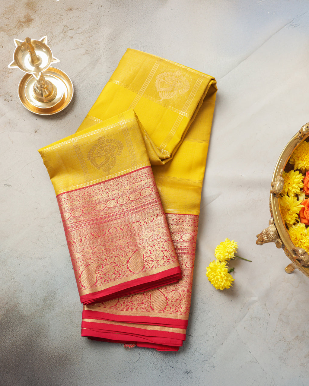 Classic yellow Kanchipuram saree