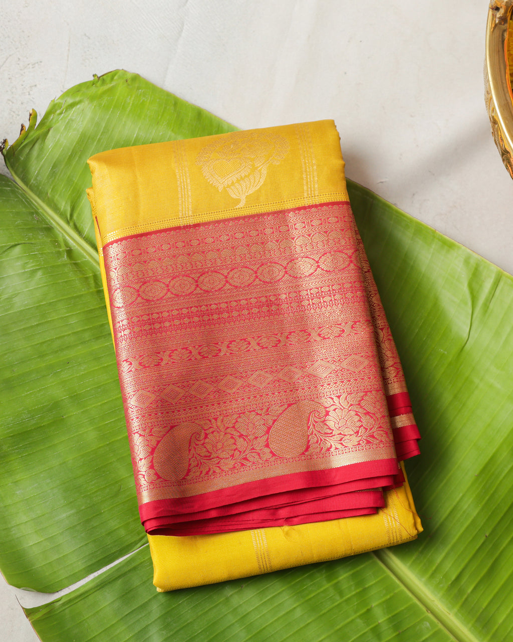 Classic yellow Kanchipuram saree