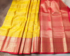 Classic yellow Kanchipuram saree