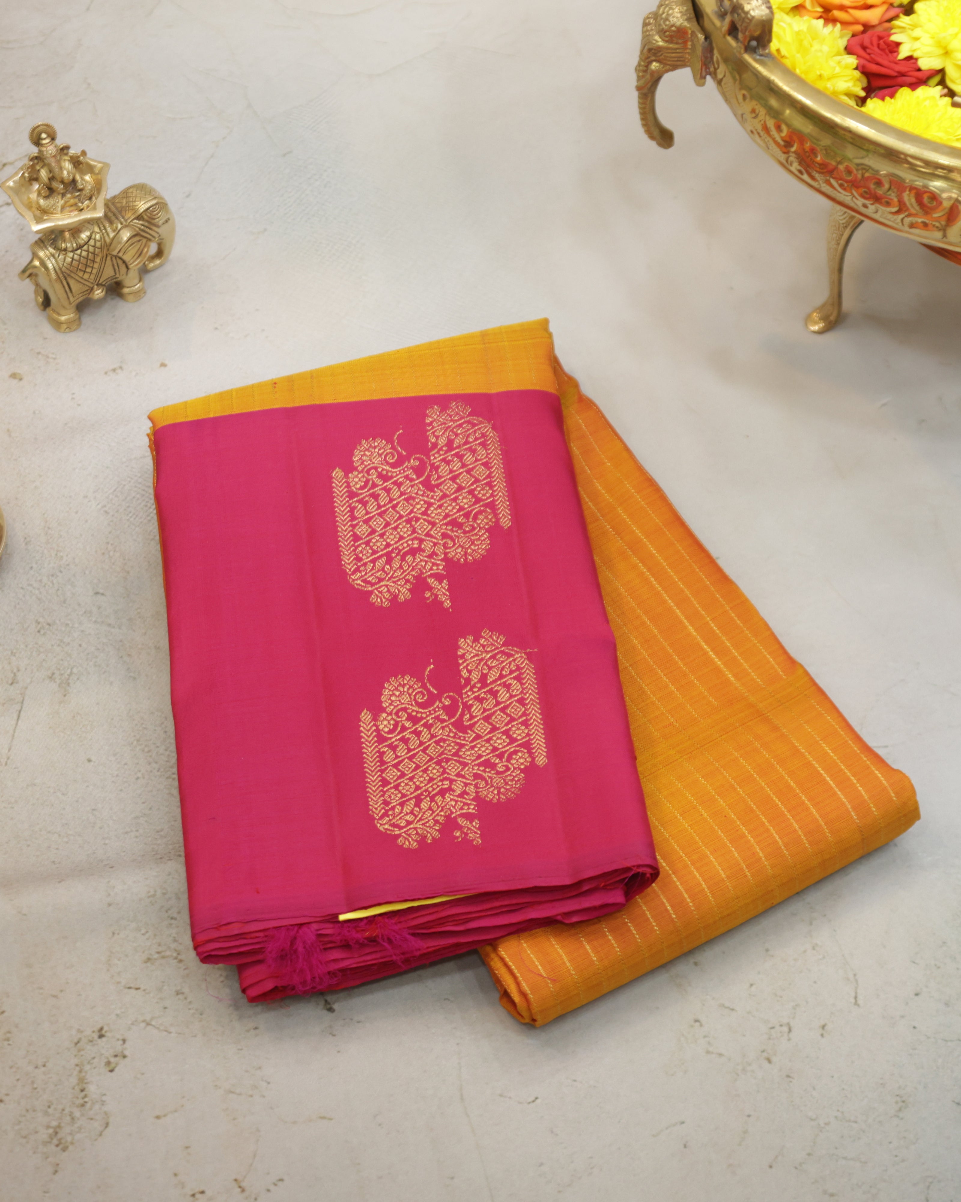 Kanchipuram Pure Silk Saree in Turmeric Yellow & Rani Pink with Zari Border