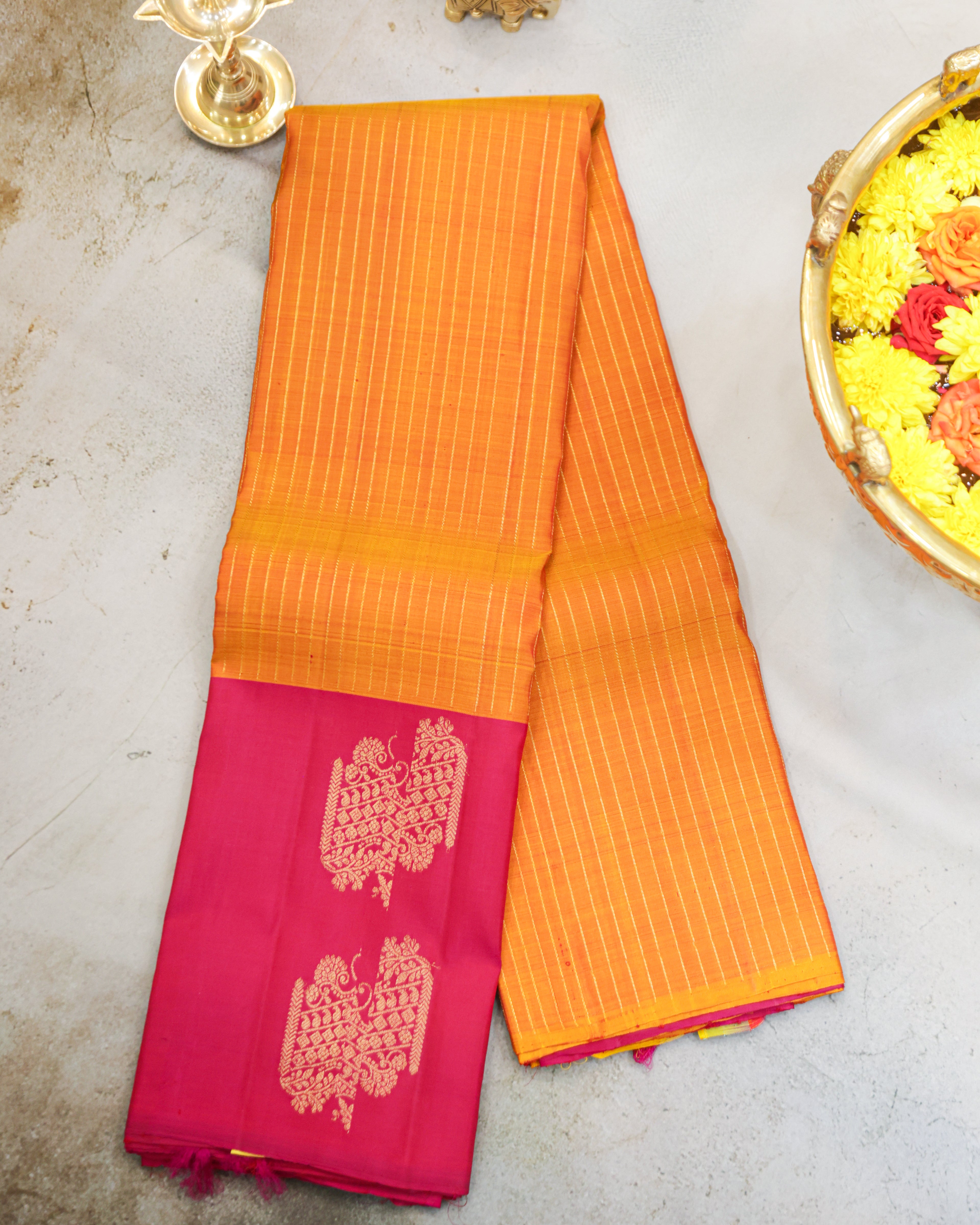 Kanchipuram Pure Silk Saree in Turmeric Yellow & Rani Pink with Zari Border