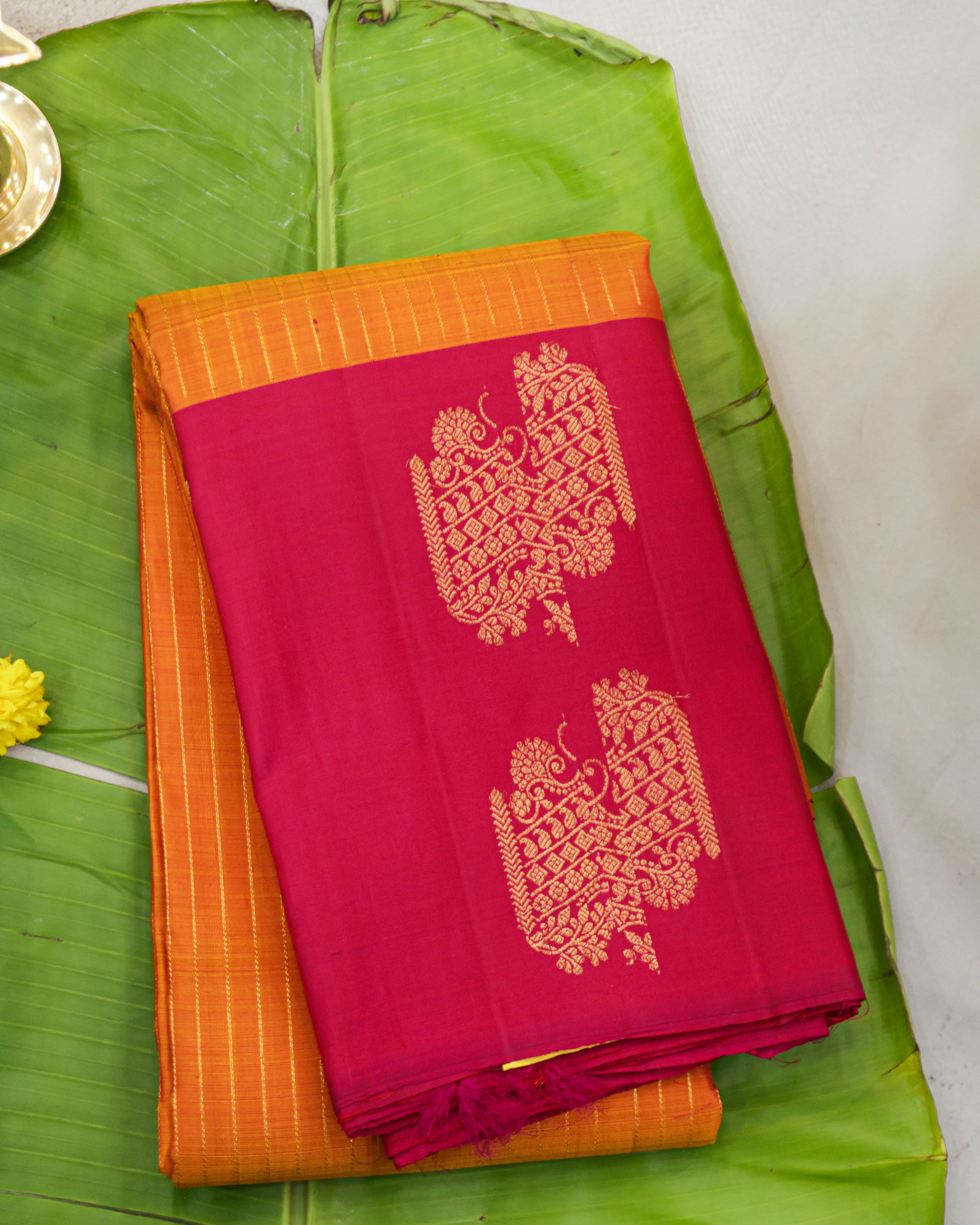 Kanchipuram Pure Silk Saree in Turmeric Yellow & Rani Pink with Zari Border