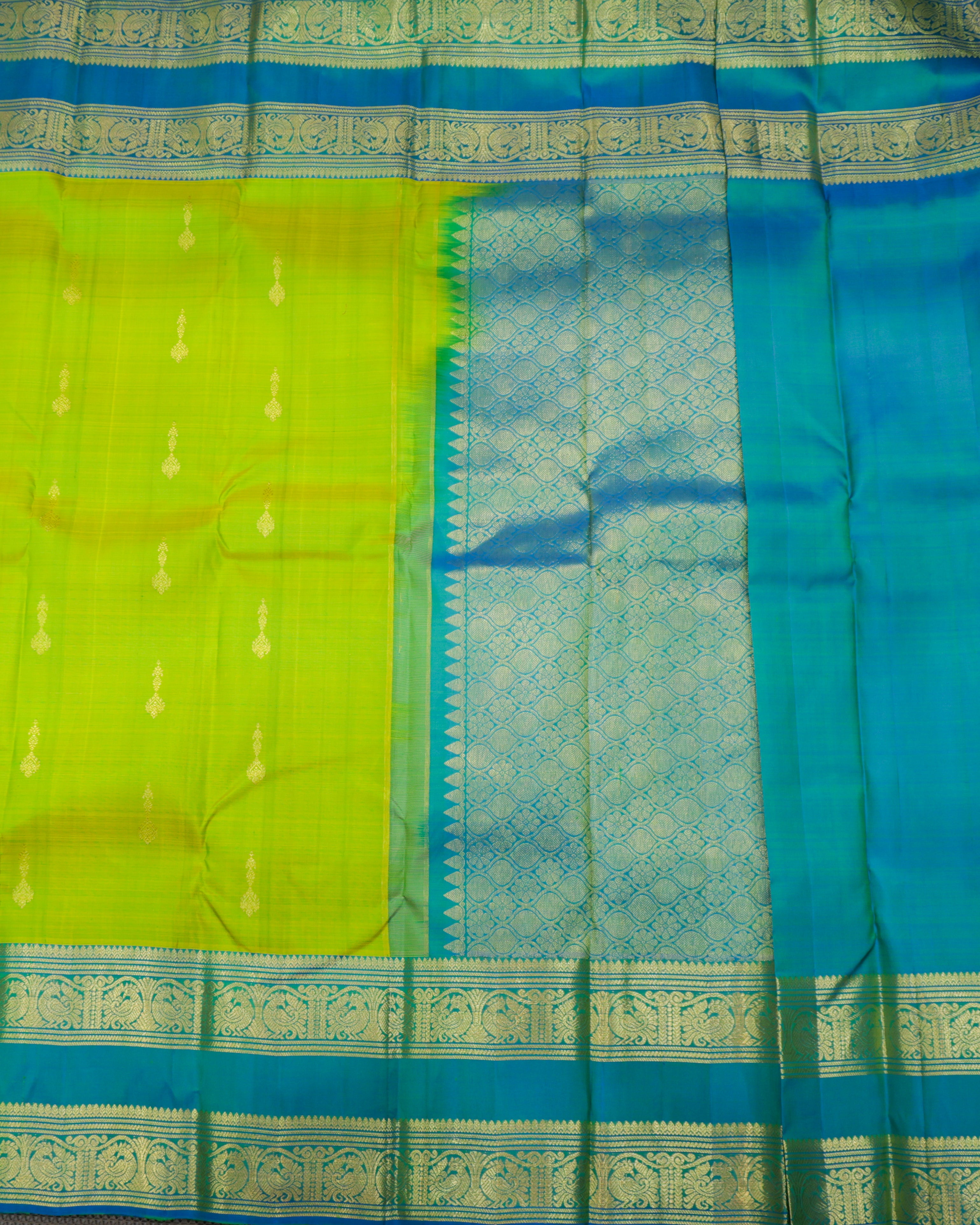 Kanchipuram Pure Silk Parrot Green & Rama Blue Butta Saree