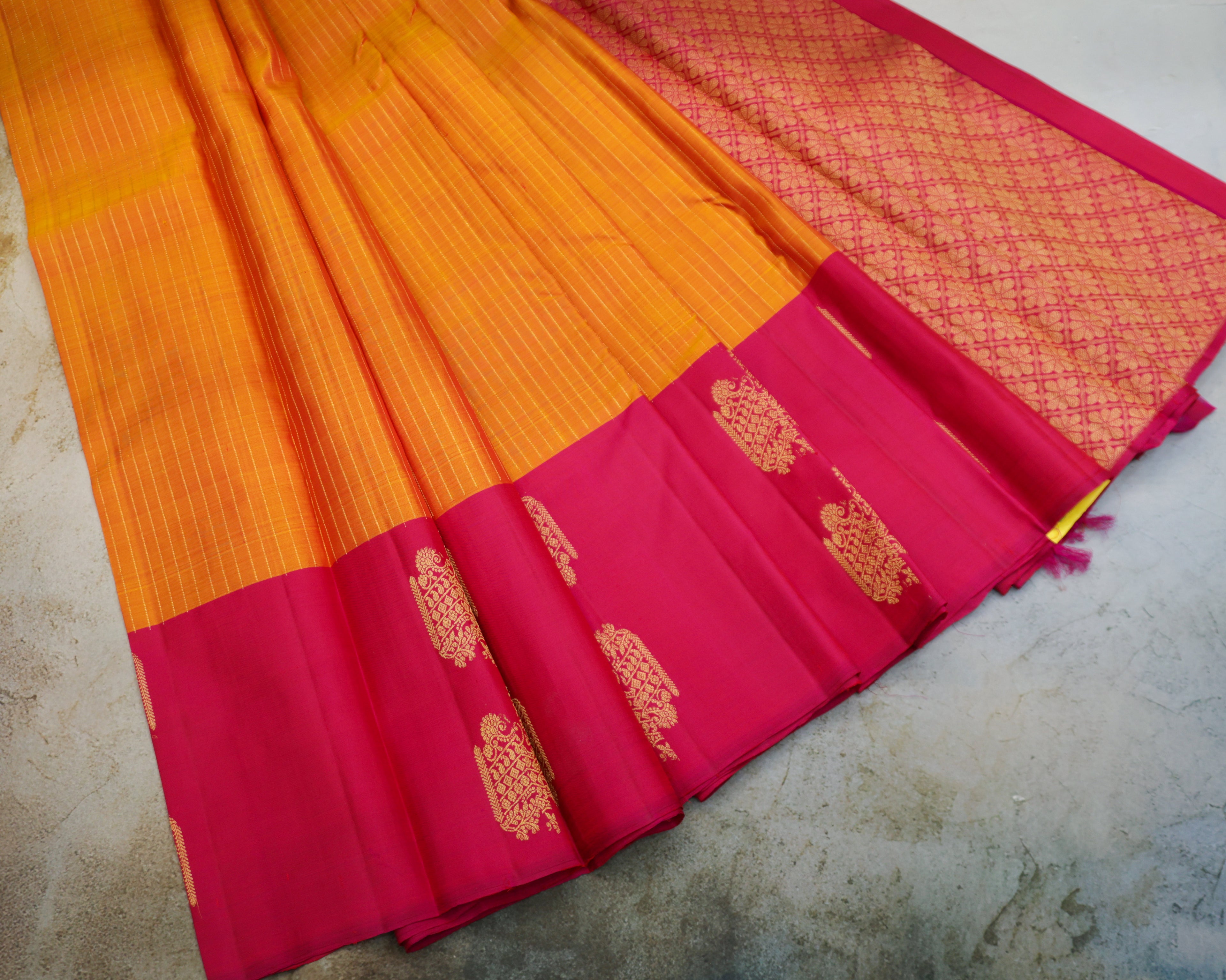 Kanchipuram Pure Silk Saree in Turmeric Yellow & Rani Pink with Zari Border