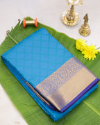 Kanchipuram Embossed Soft Silk Saree in Rama Blue & Dark Purple
