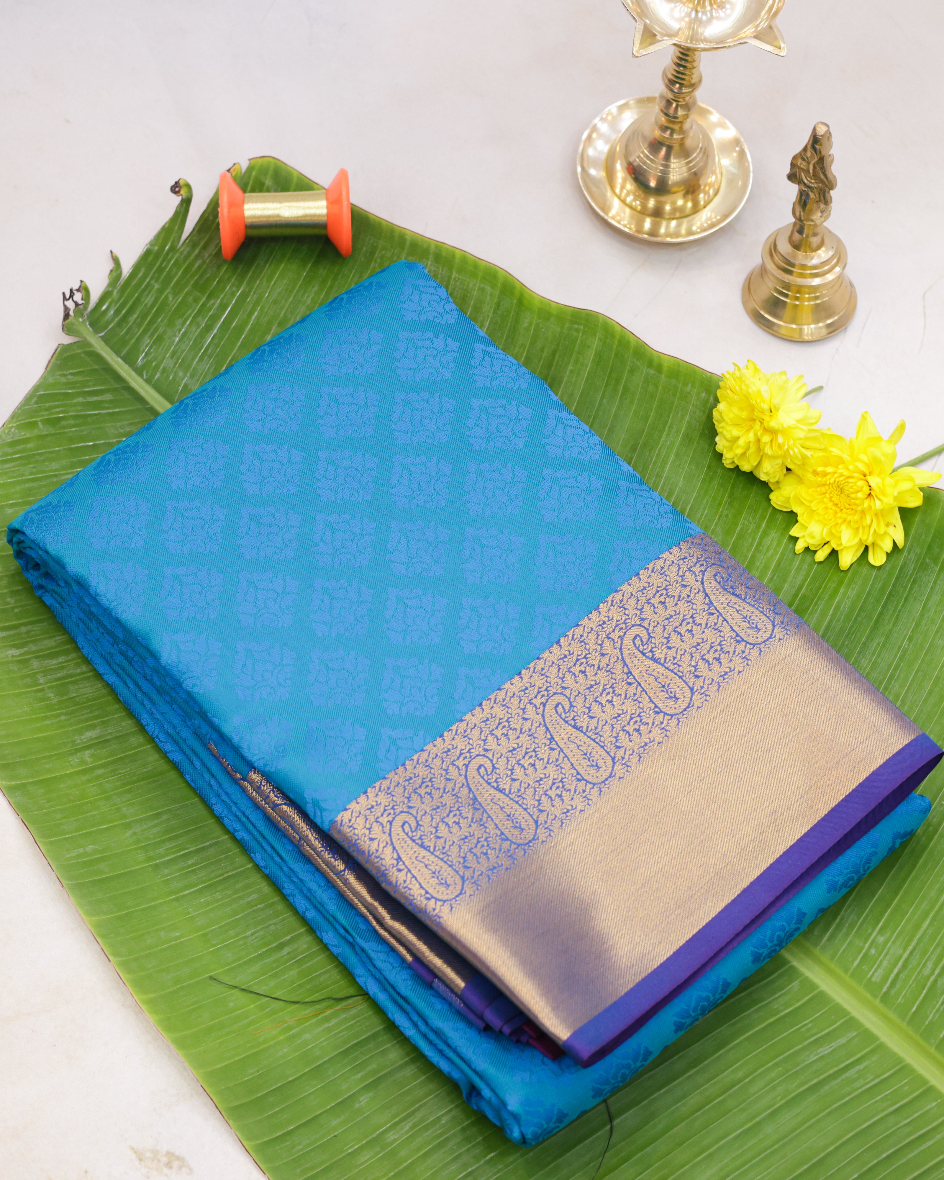 Kanchipuram Embossed Soft Silk Saree in Rama Blue & Dark Purple