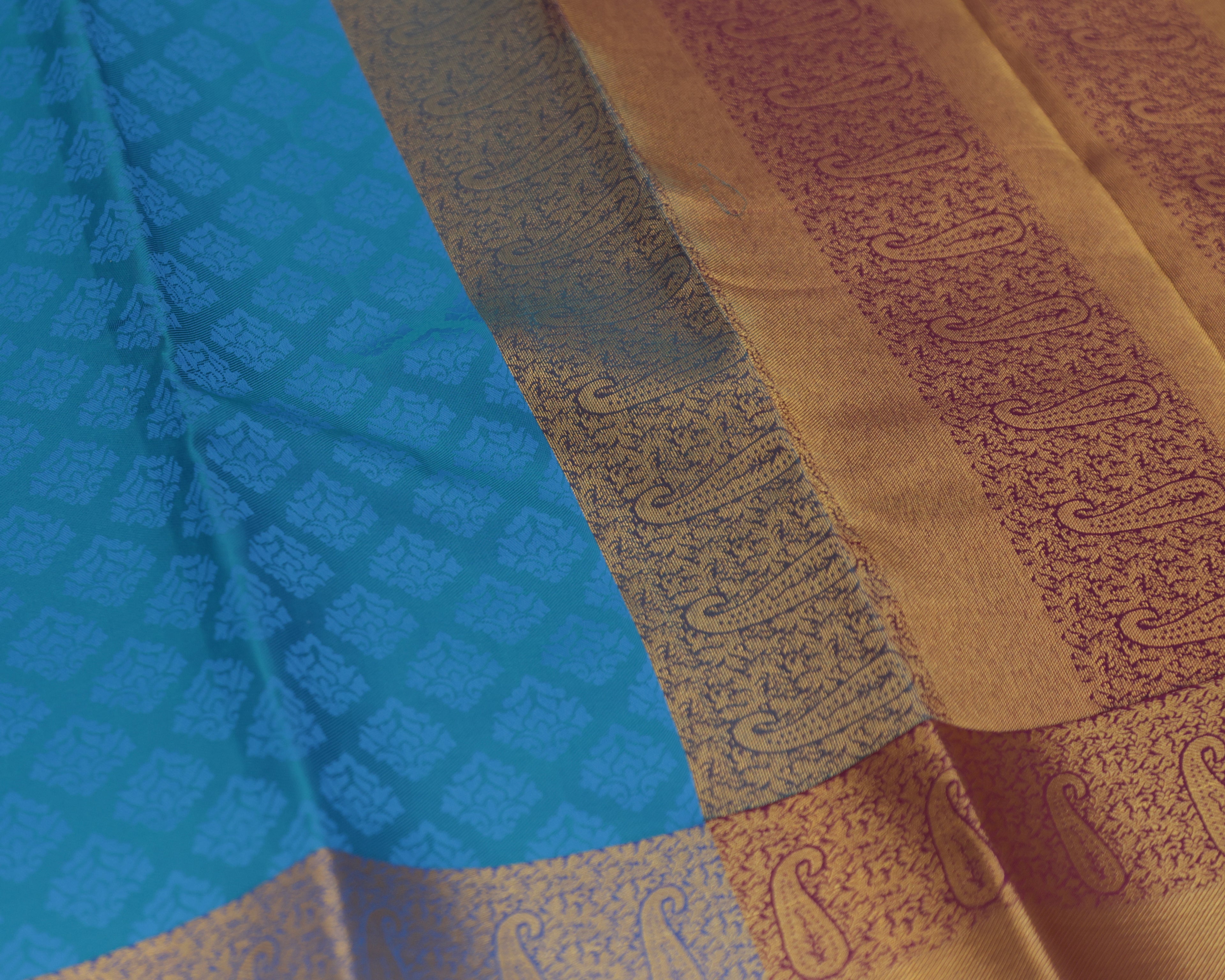 Kanchipuram Embossed Soft Silk Saree in Rama Blue & Dark Purple
