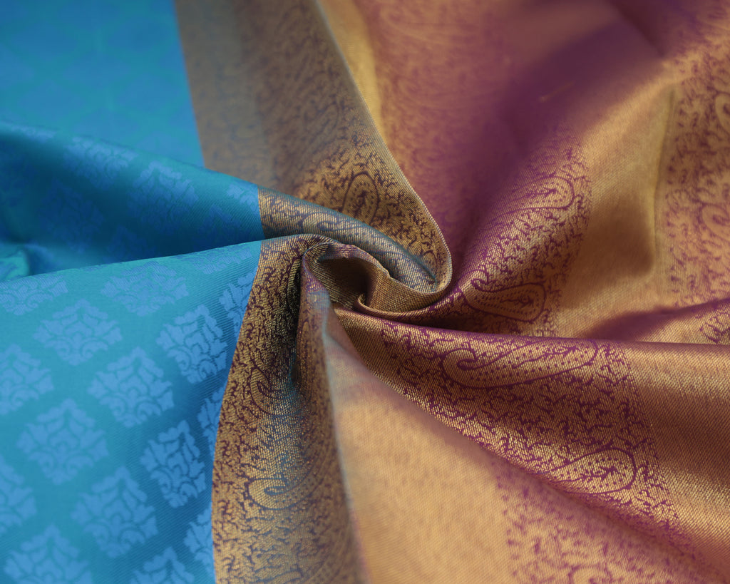 Kanchipuram Embossed Soft Silk Saree in Rama Blue & Dark Purple