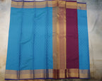 Kanchipuram Embossed Soft Silk Saree in Rama Blue & Dark Purple