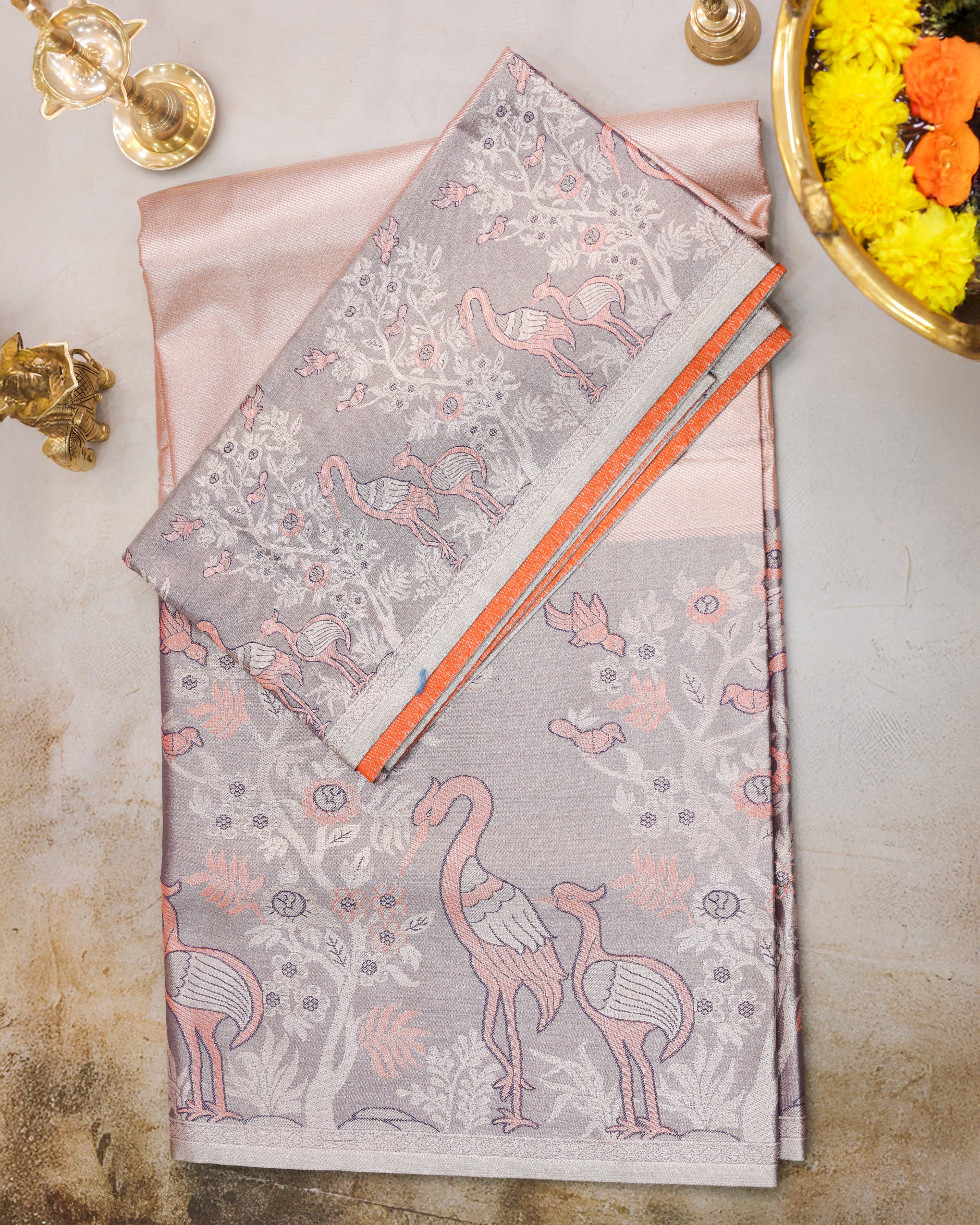 Kanchipuram Tissue Fancy Saree in Orange Golden with Meena Kari Work