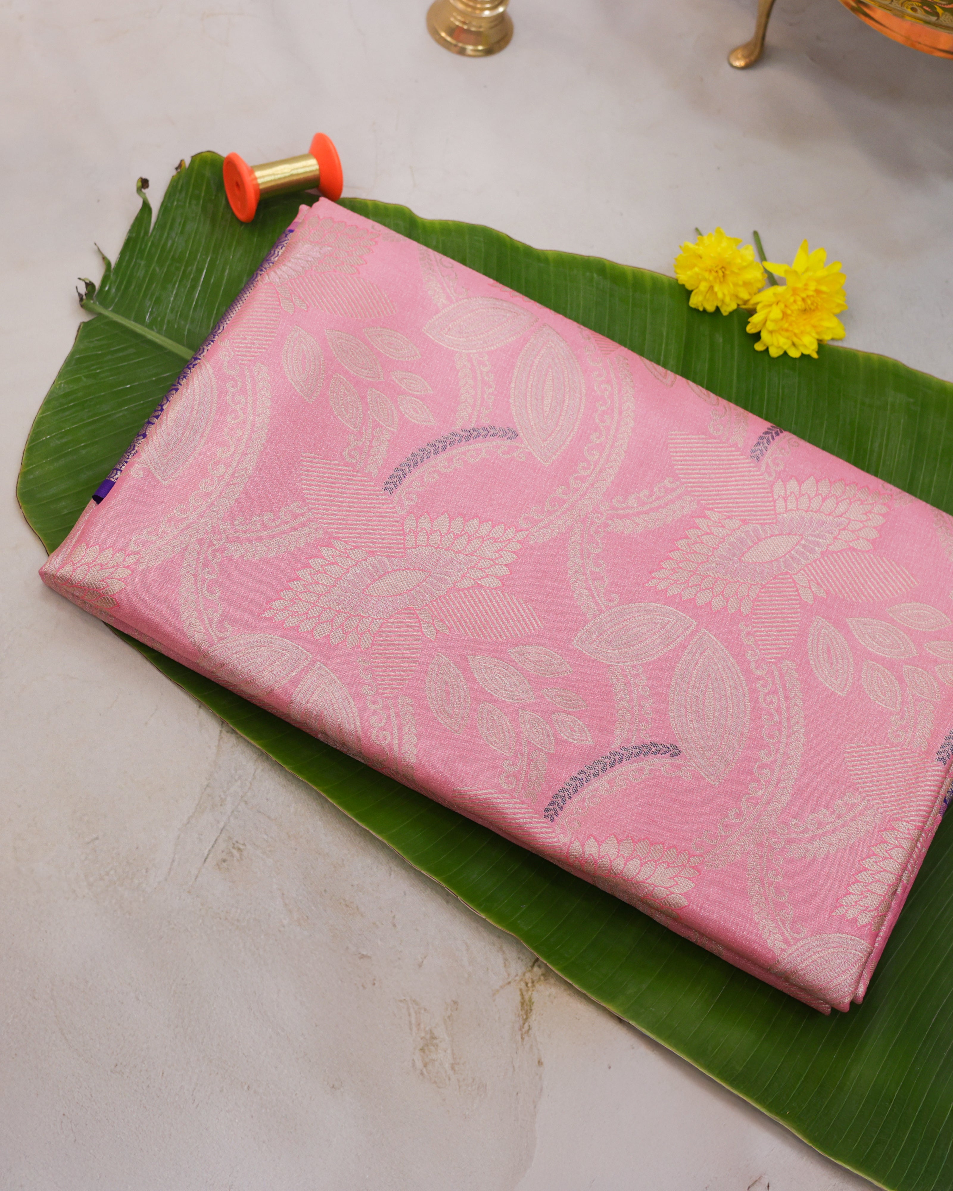 Pink Kanchipuram Tissue Saree with All-Over Golden Zari Design