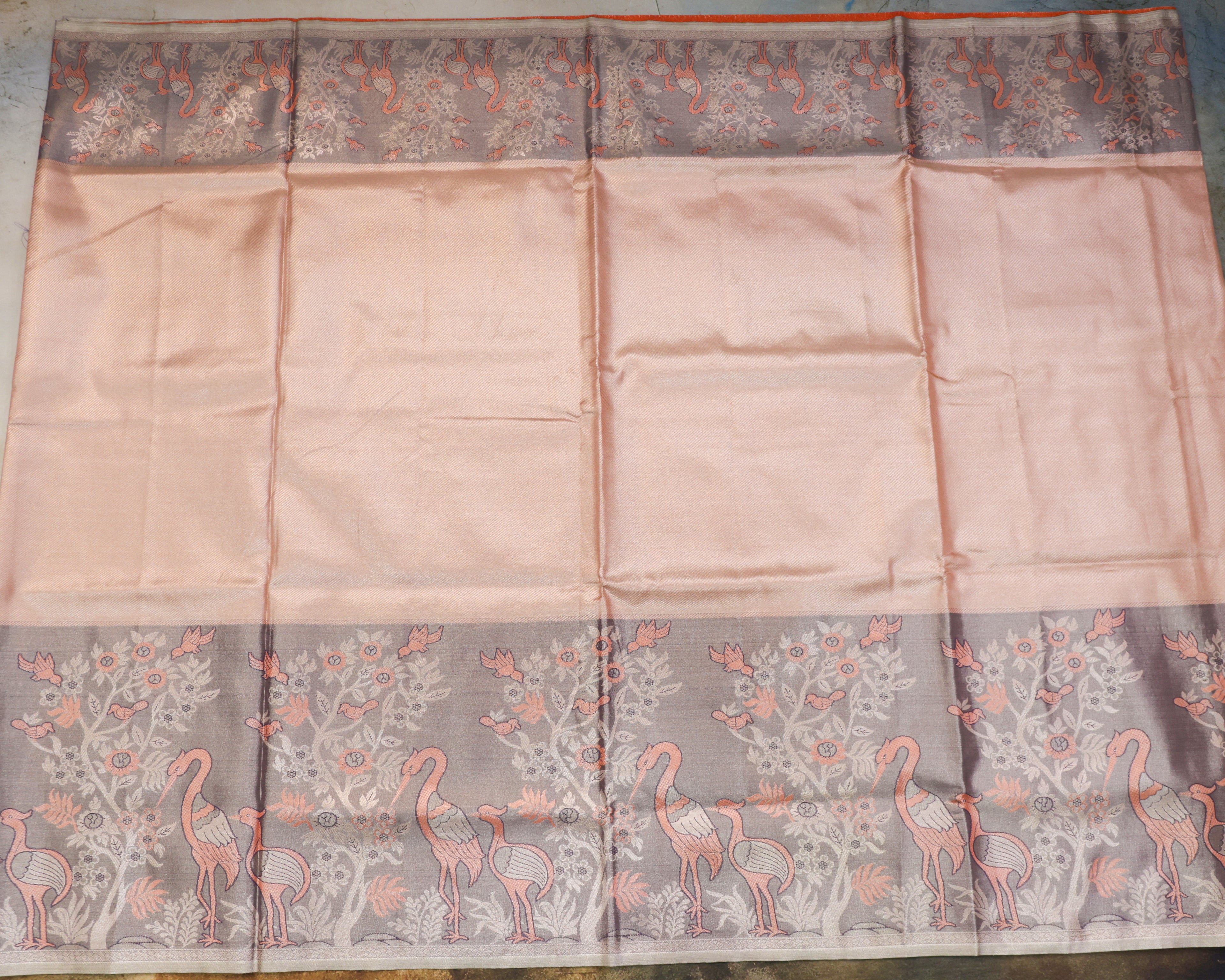 Kanchipuram Tissue Fancy Saree in Orange Golden with Meena Kari Work