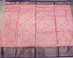 Pink Kanchipuram Tissue Saree with All-Over Golden Zari Design